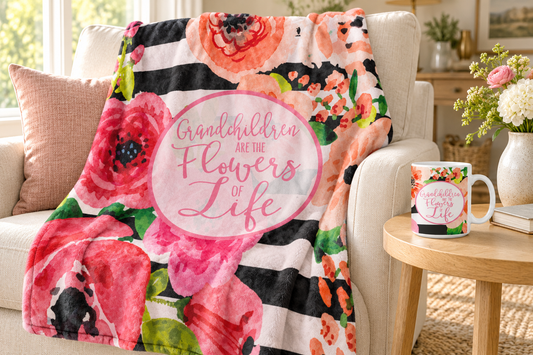 Grandchildren Are the Flowers of Life blanket on an ivory armchair with the matching floral mug on a side table.
